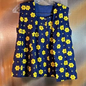 Vintage 2 piece navy & yellow 70’s set. Vest and skirt. 22” waist Size small 120